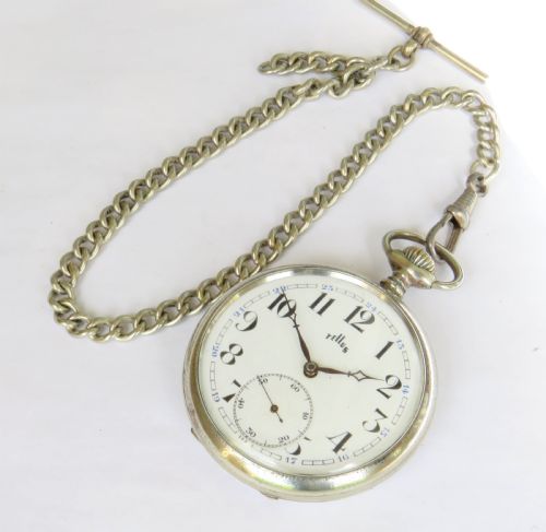 fig 1. A 1930s Tellus open-face pocket watch featuring a white dial with black Arabic numerals and a silver-tone curb link chain with a T-bar.