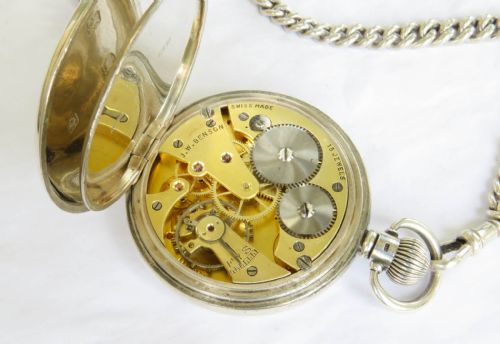 fig 3. Silver Cyma pocket watch and chain, J W Benson, 1934