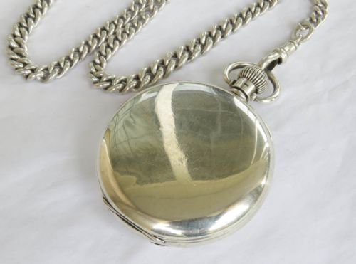 fig 4. Silver Cyma pocket watch and chain, J W Benson, 1934