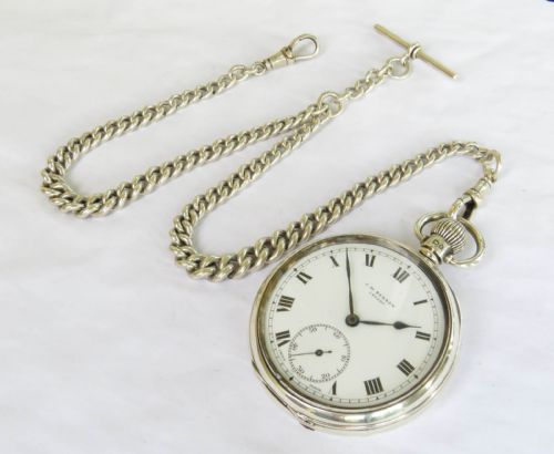 fig 1. Silver Cyma pocket watch and chain, J W Benson, 1934