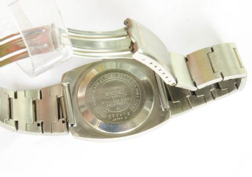 fig 2. A gents Seiko Lord Matic stainless steel automatic wristwatch featuring a black dial face with day-date display and integrated steel link bracelet.