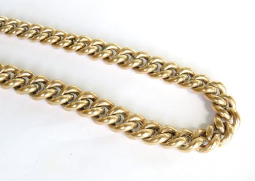 fig 1. An antique rolled gold Albert watch chain with thick curb links, a T-bar attachment, and a swivel clasp.