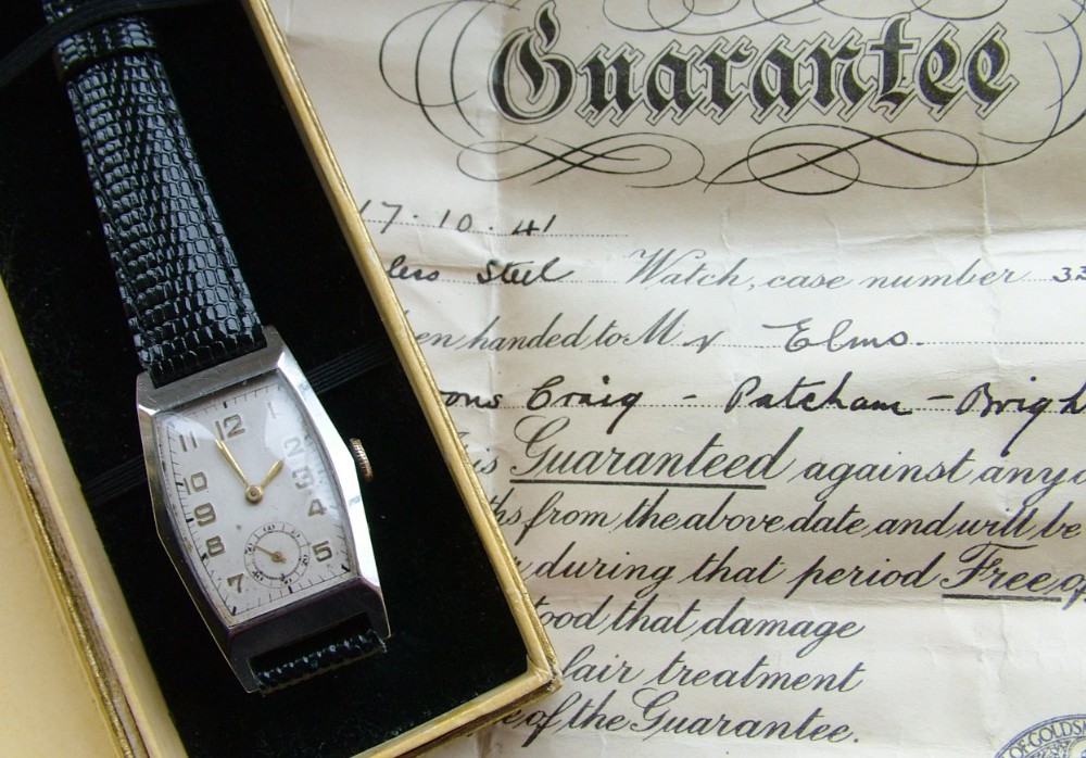 Gents 1940s wrist watch with original box & papers