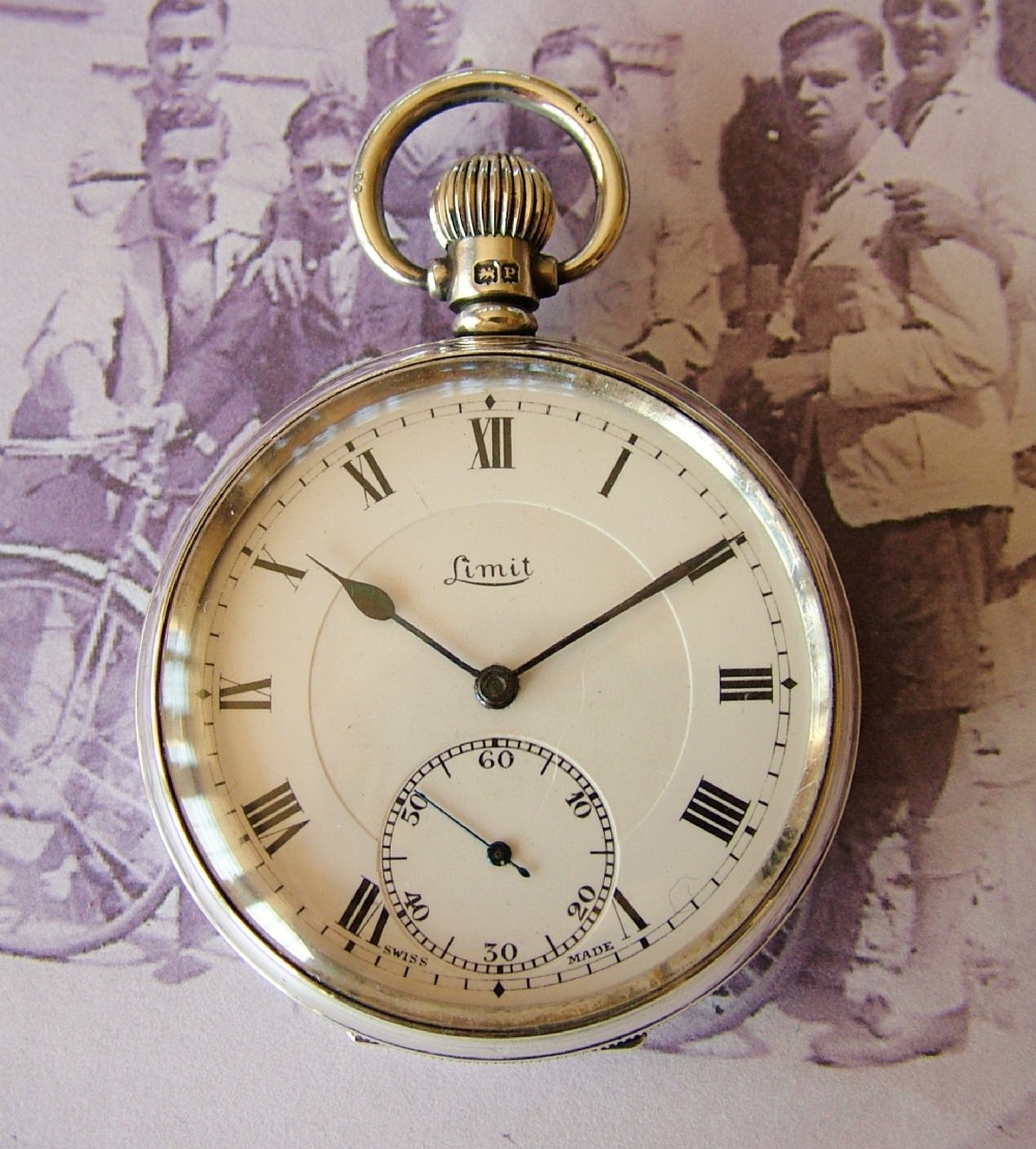 A vintage 1939 silver Limit stem winding pocket watch