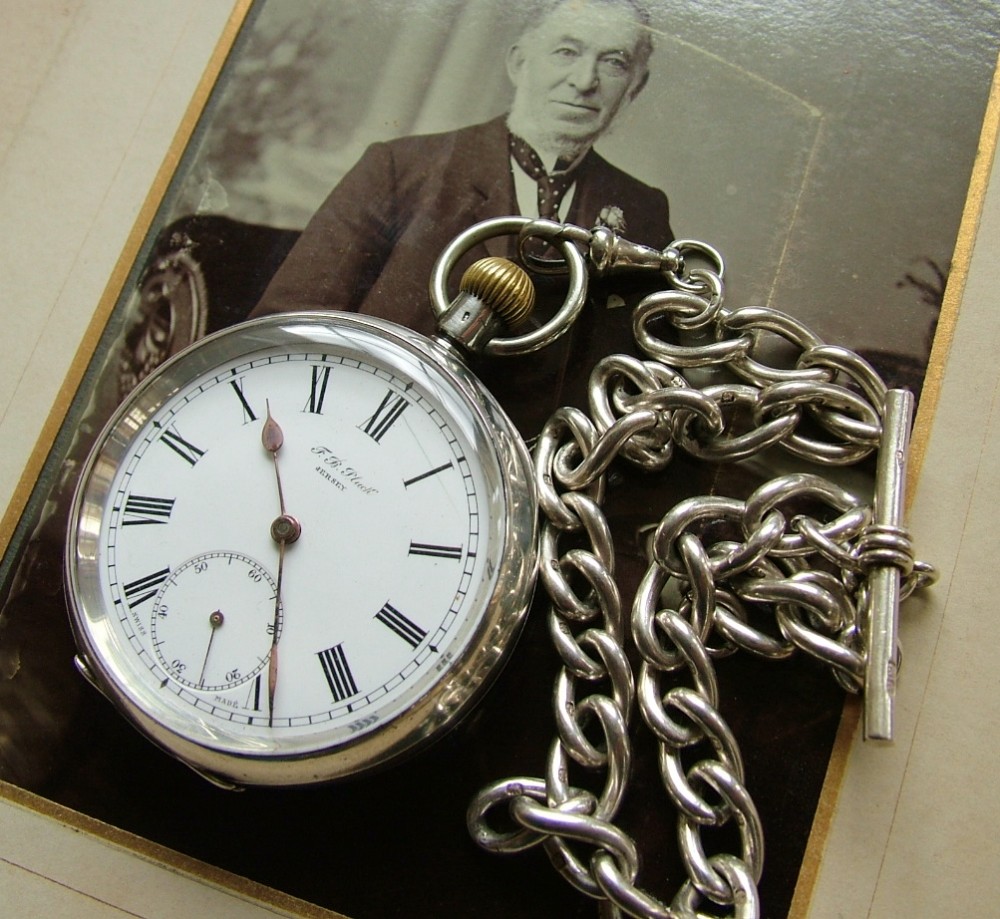 Antique silver Omega pocket watch and chain