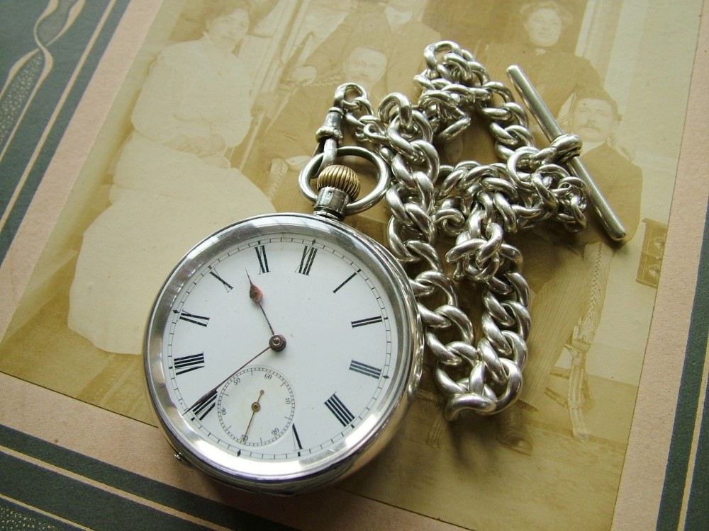Antique Omega pocket watch and chain
