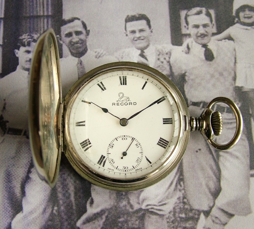 A vintage 1930s Record full hunter pocket watch.