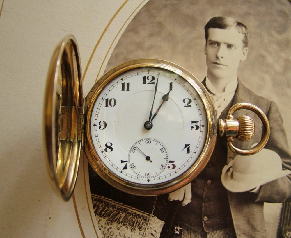 An antique Record full hunter pocket watch