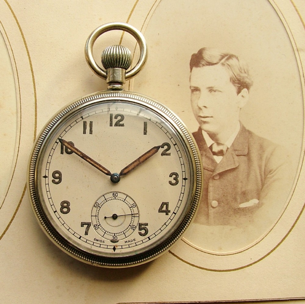 A vintage 1930s Revue stem winding pocket watch.