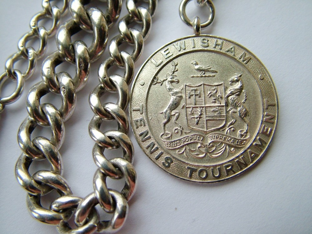 Heavy antique silver watch chain and armorial fob