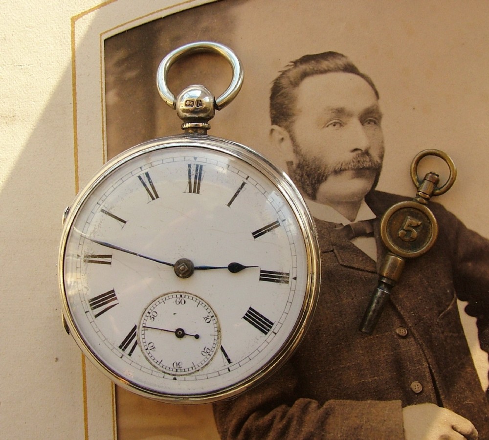 An antique 1883 Chester silver pocket watch.