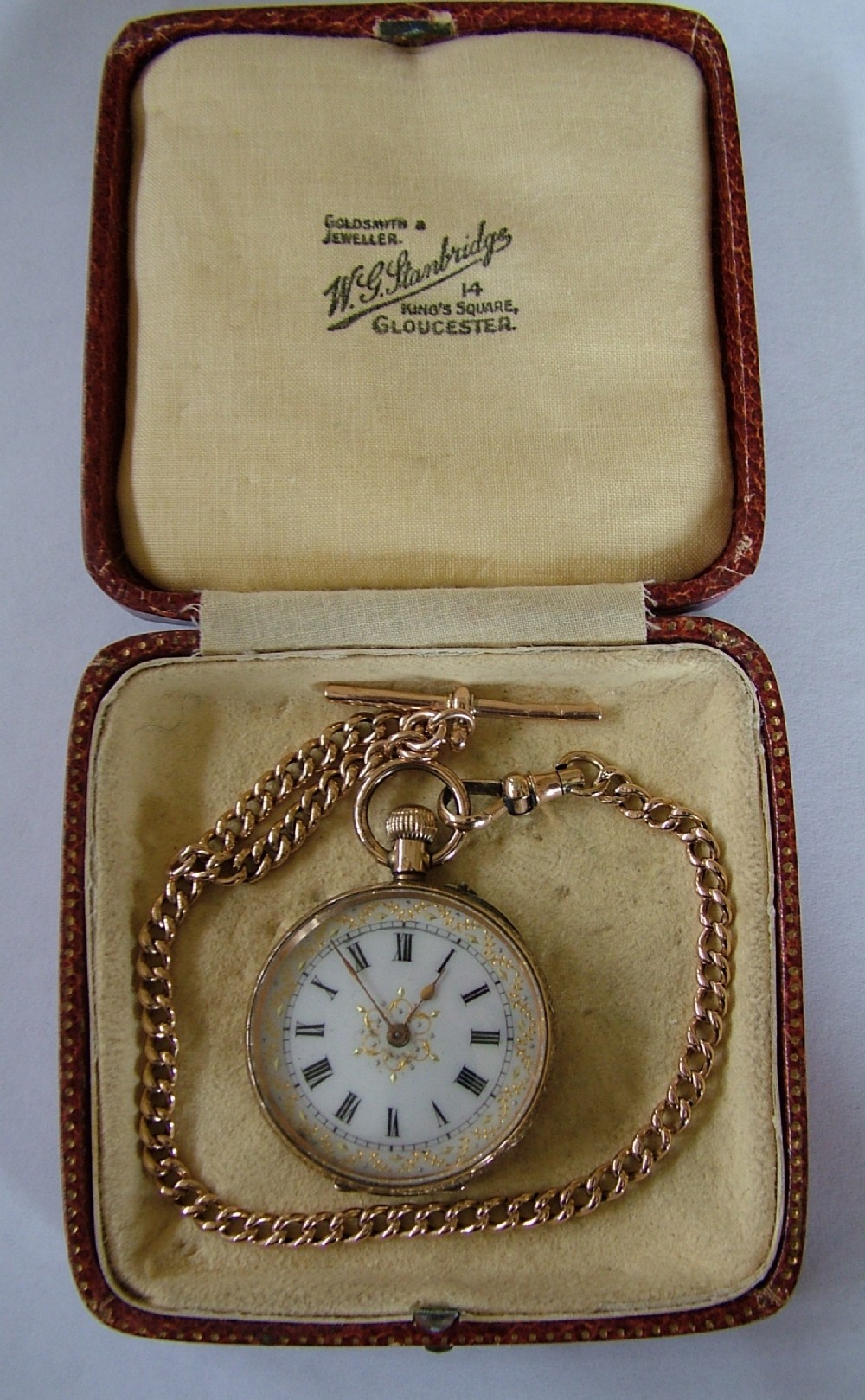 A lady’s Edwardian 14ct gold fob watch with 9ct gold chain