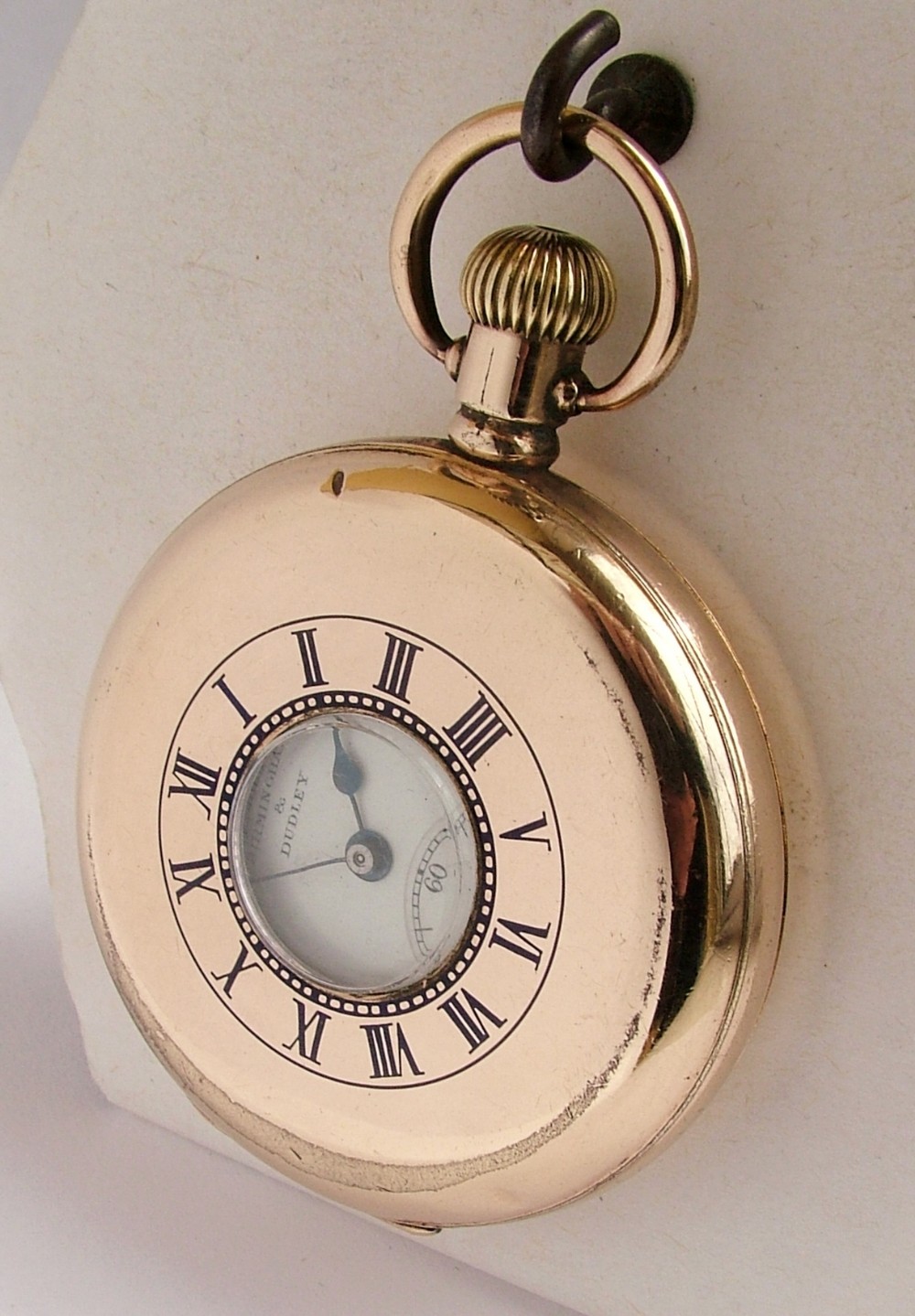 A 1920s Minerva half hunter pocket watch originally retailed by W.E.Johnson Birmingham & Dudley.