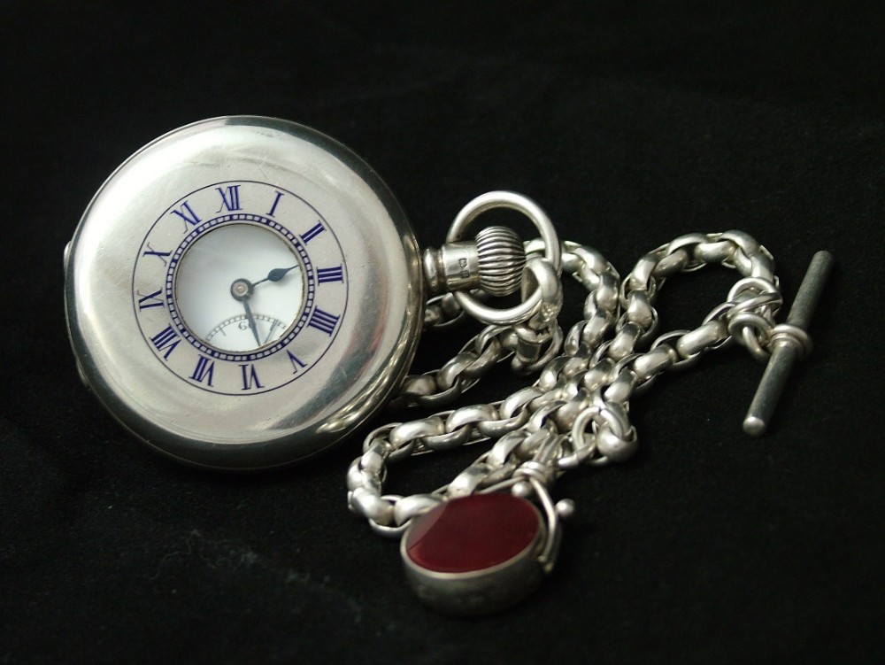 Silver half hunter pocket watch, chain and swivel