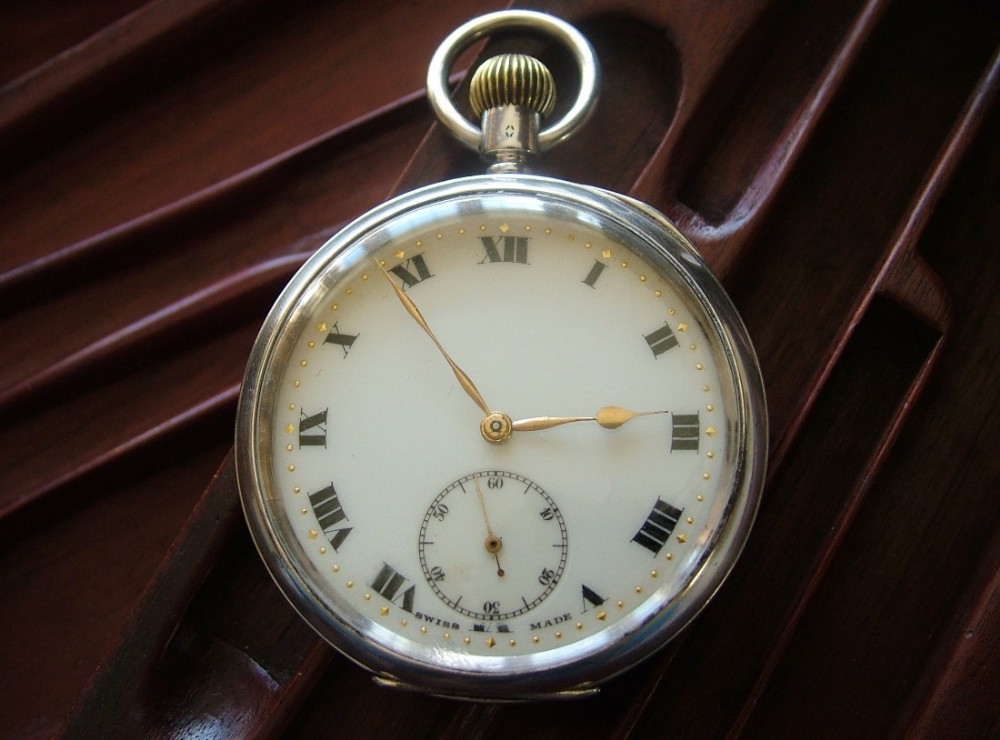 An antique silver pocket watch, 1919