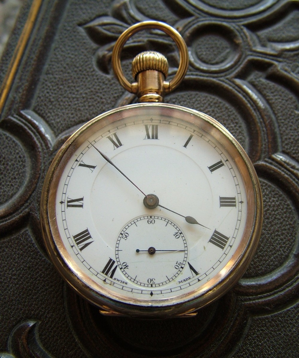 An antique gold plated pocket watch