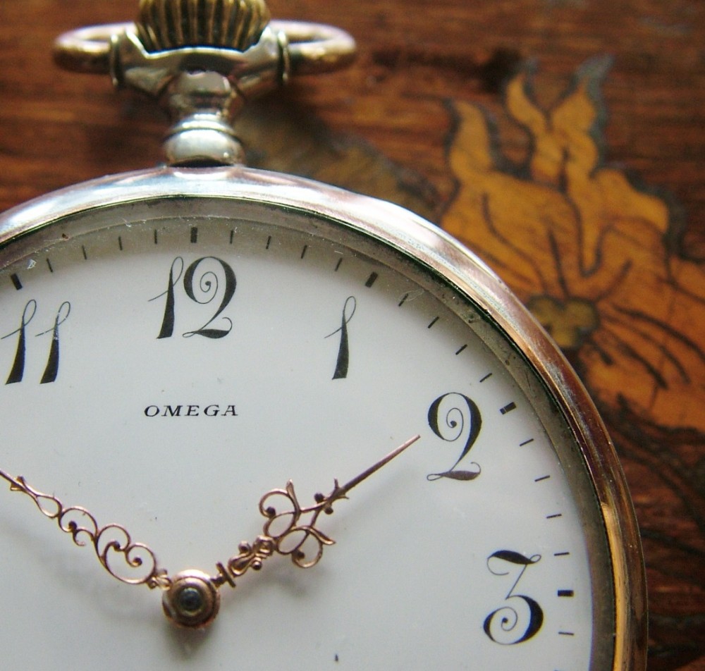 An antique galonne cased Omega pocket watch