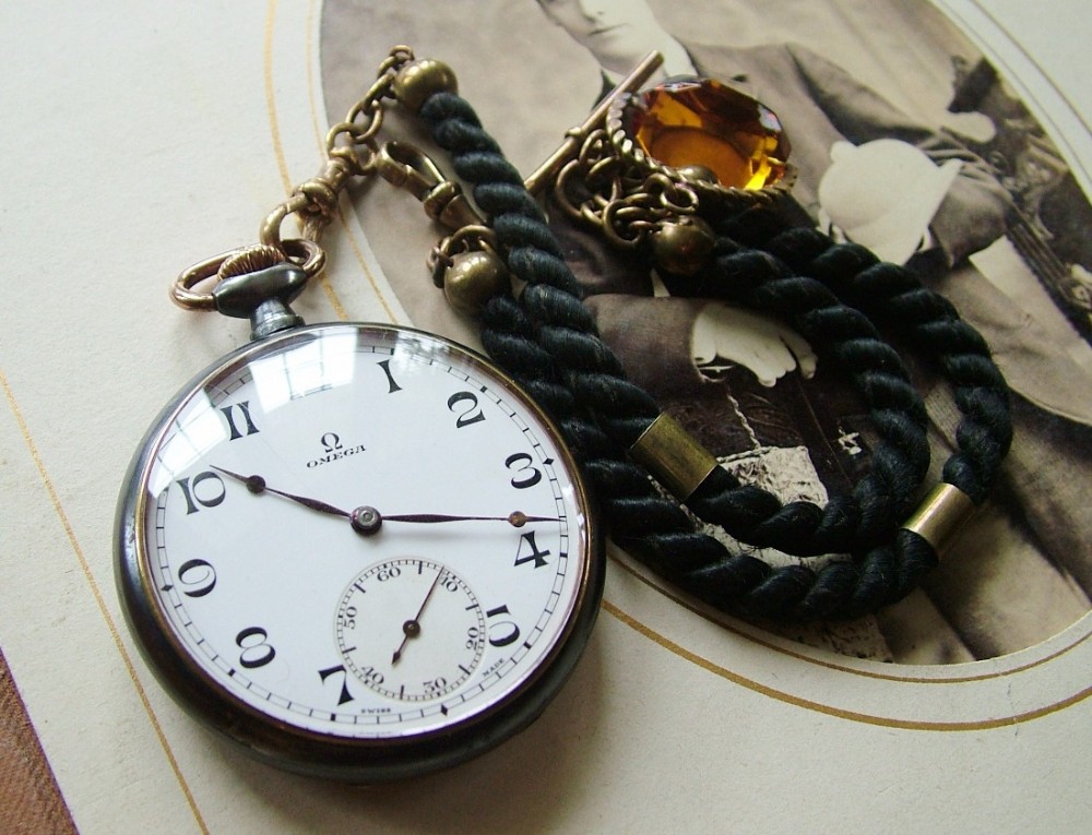 1920s Omega gun metal pocket watch with albert