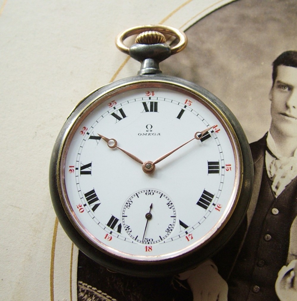 A 1920s Omega gun metal cased pocket watch