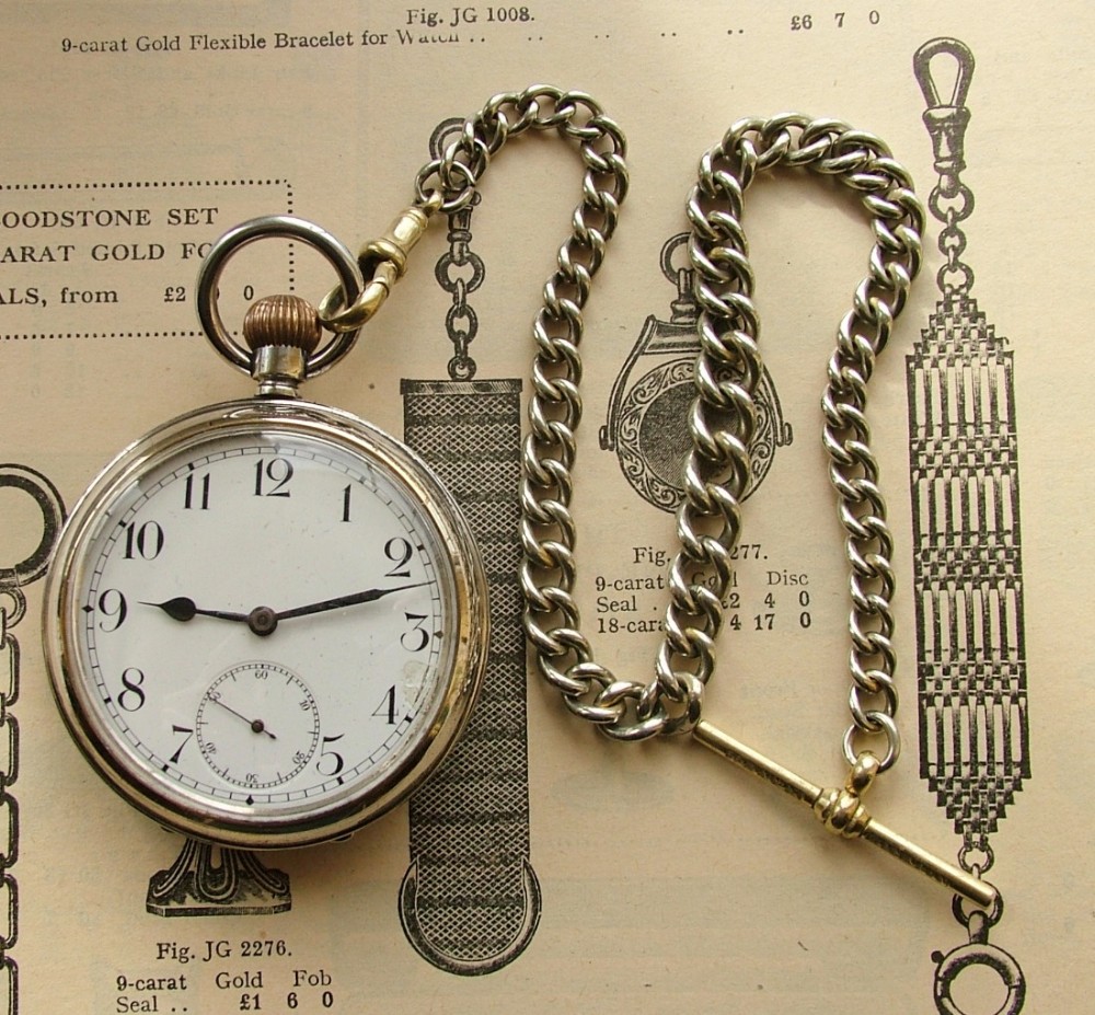 An antique Omega pocket watch & chain