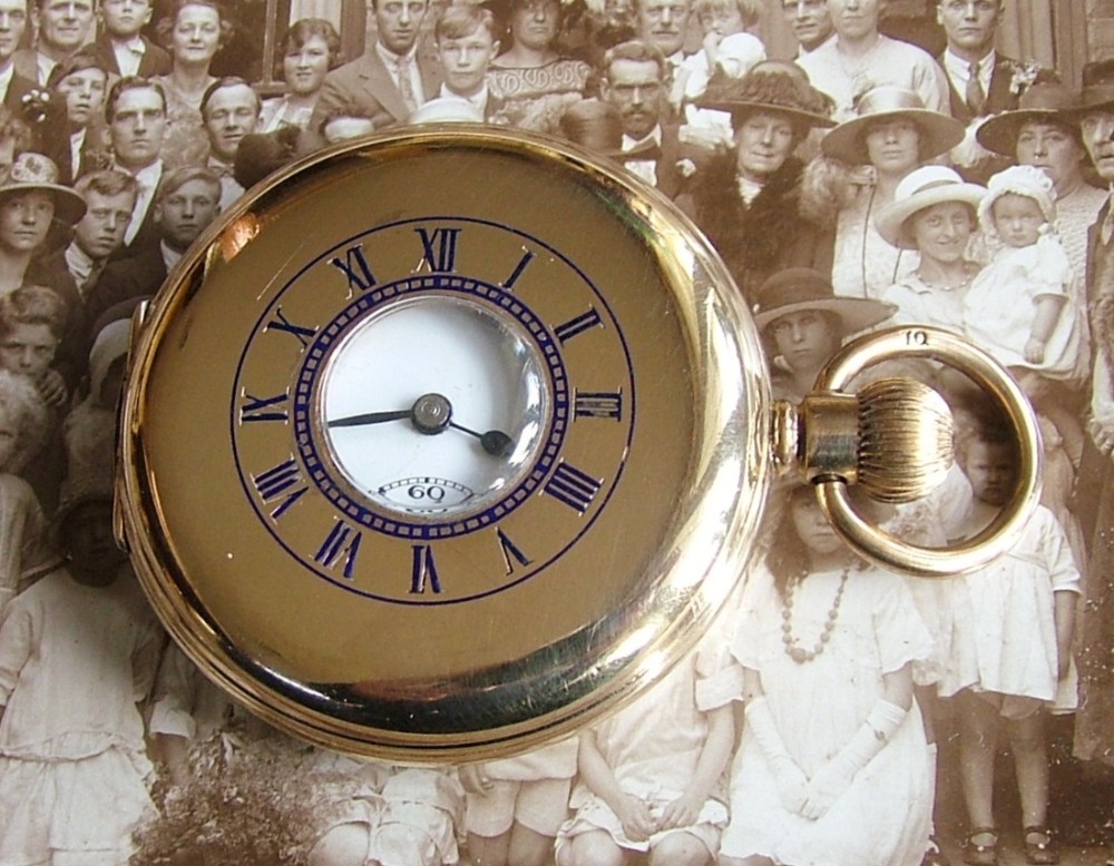 A 1920s Swiss  half hunter pocket watch