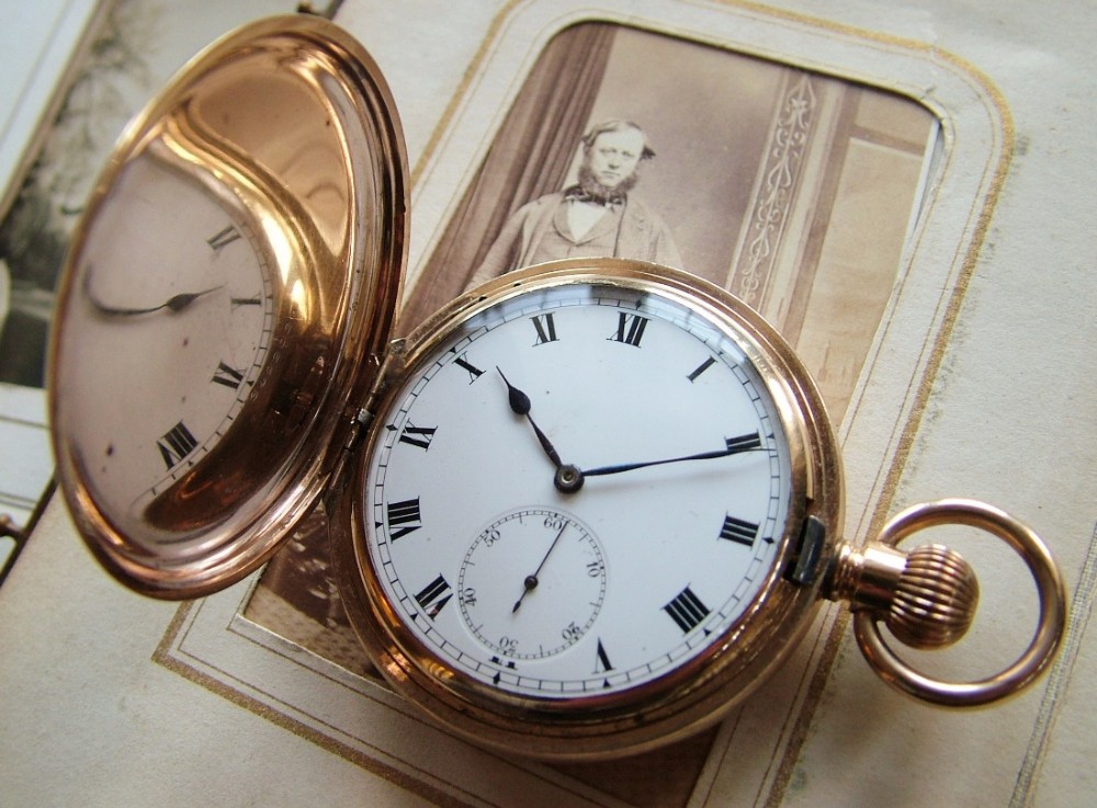 An antique full hunter pocket watch