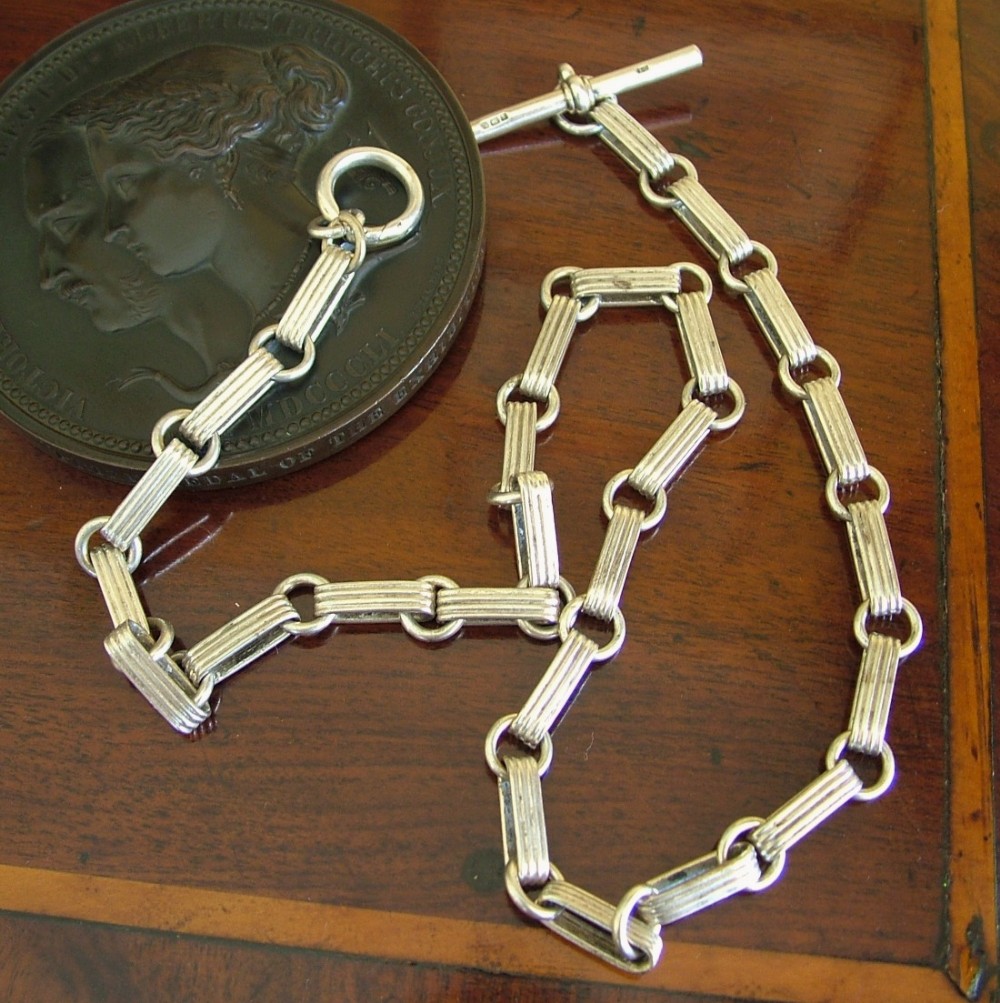 A late Victorian silver pocket watch chain