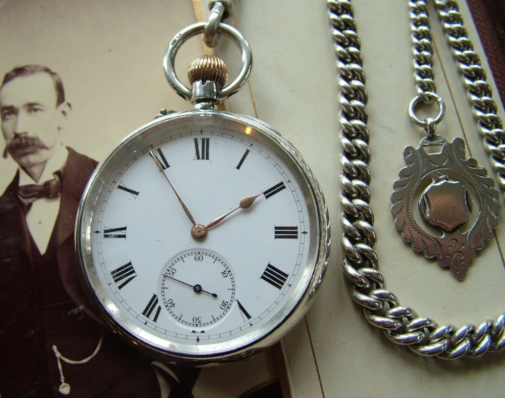 Antique silver Longines pocket watch with chain