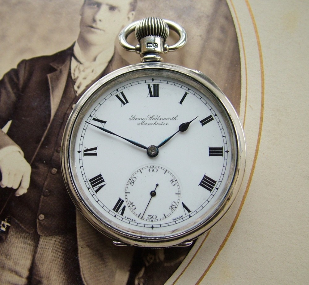 A 1928 silver Cyma pocket watch, Jms Wadsworth