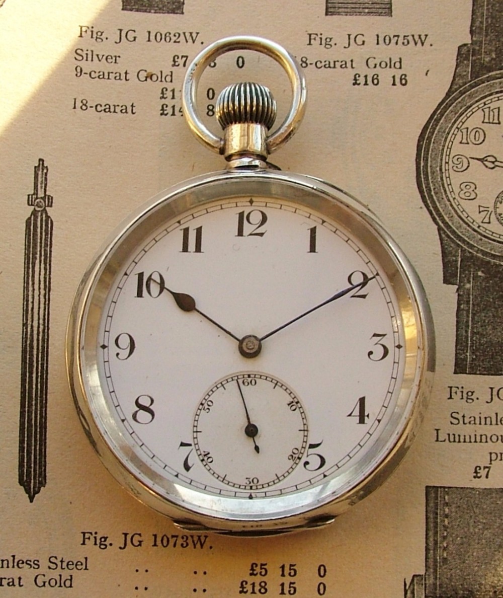 An antique 1918 silver pocket watch