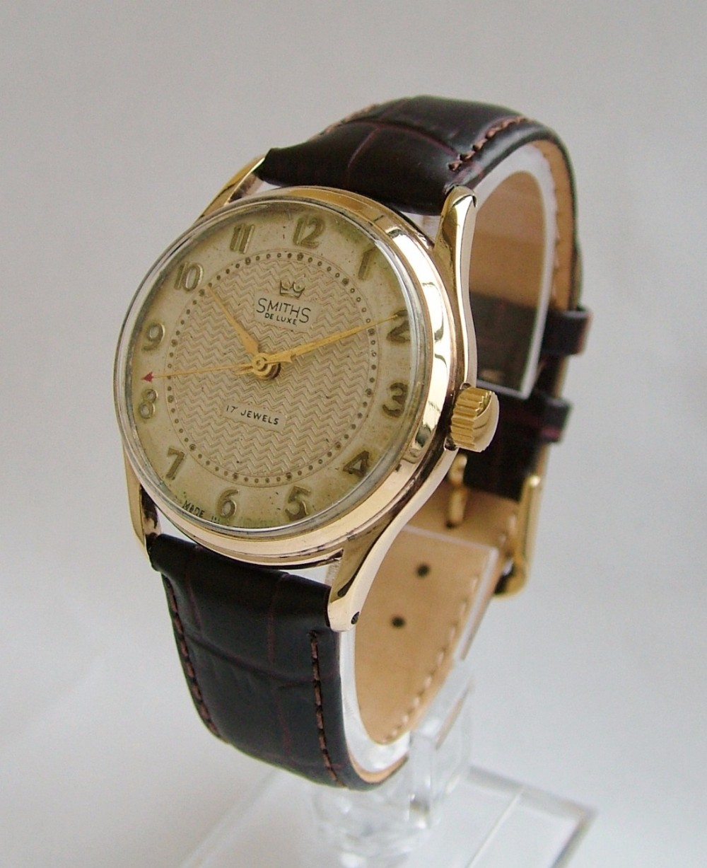 Gents 9ct gold Smiths De Luxe watch, England