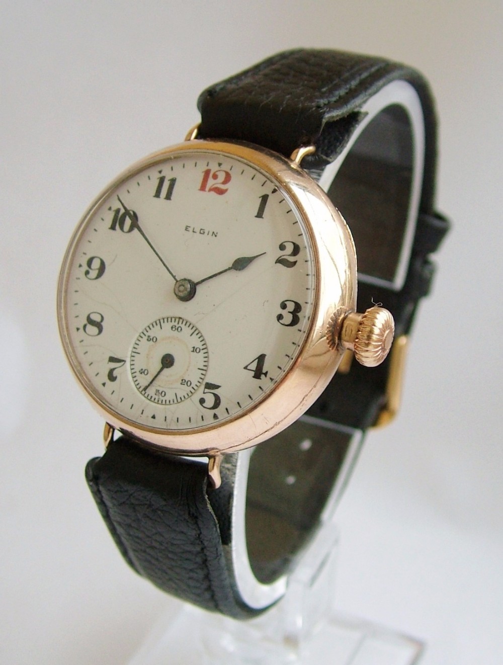 A gents 9ct gold Elgin gents wrist watch, 1920