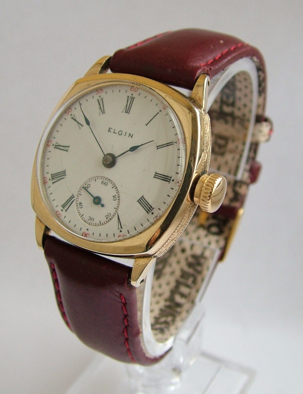 A gents antique Elgin wrist watch