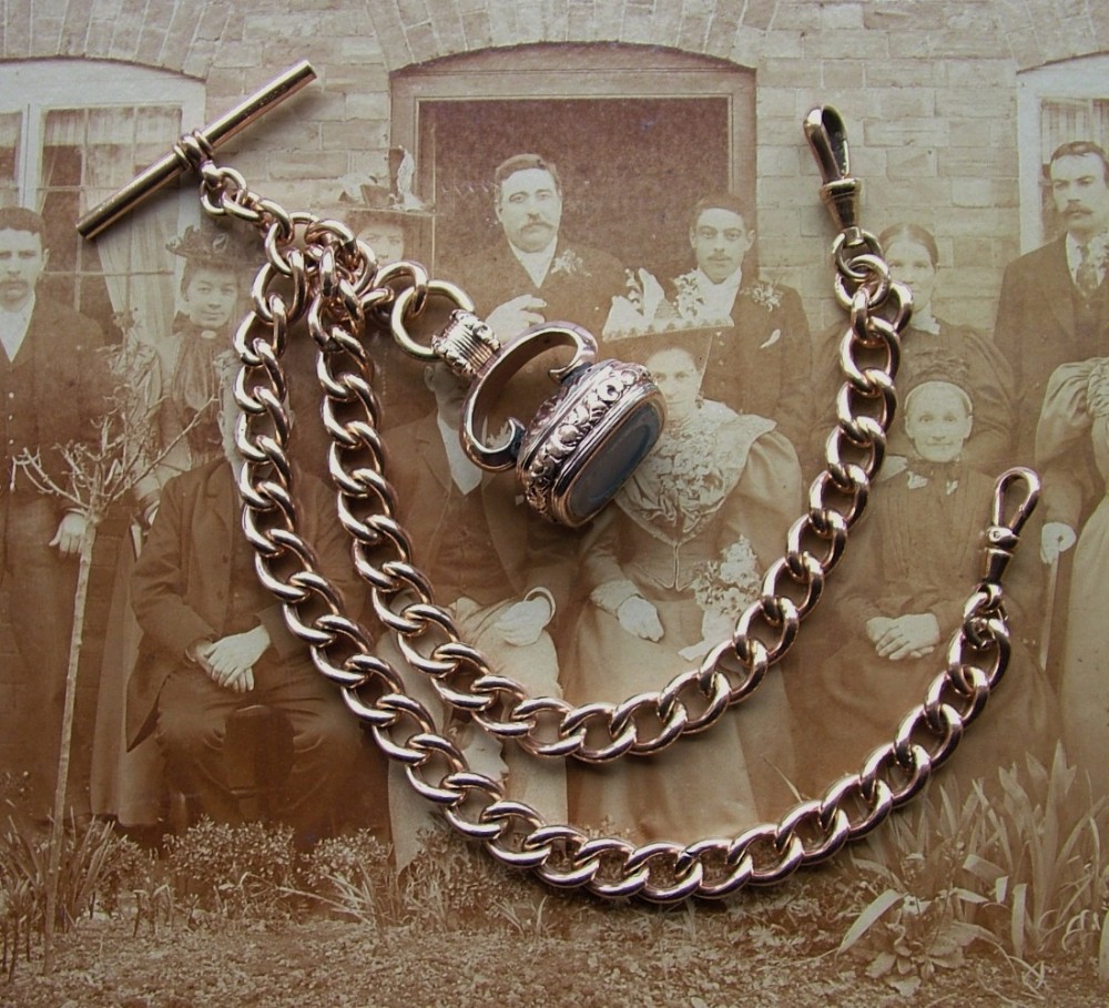 Edwardian rose gold plated double pocket watch chain & fob