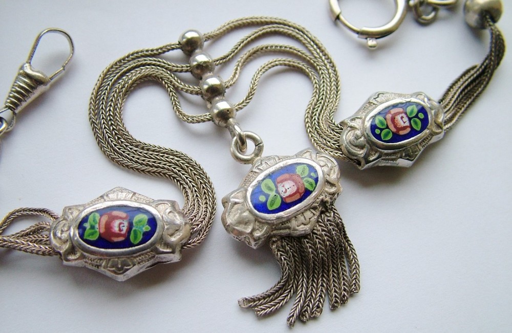 An antique silver and enamel watch chain