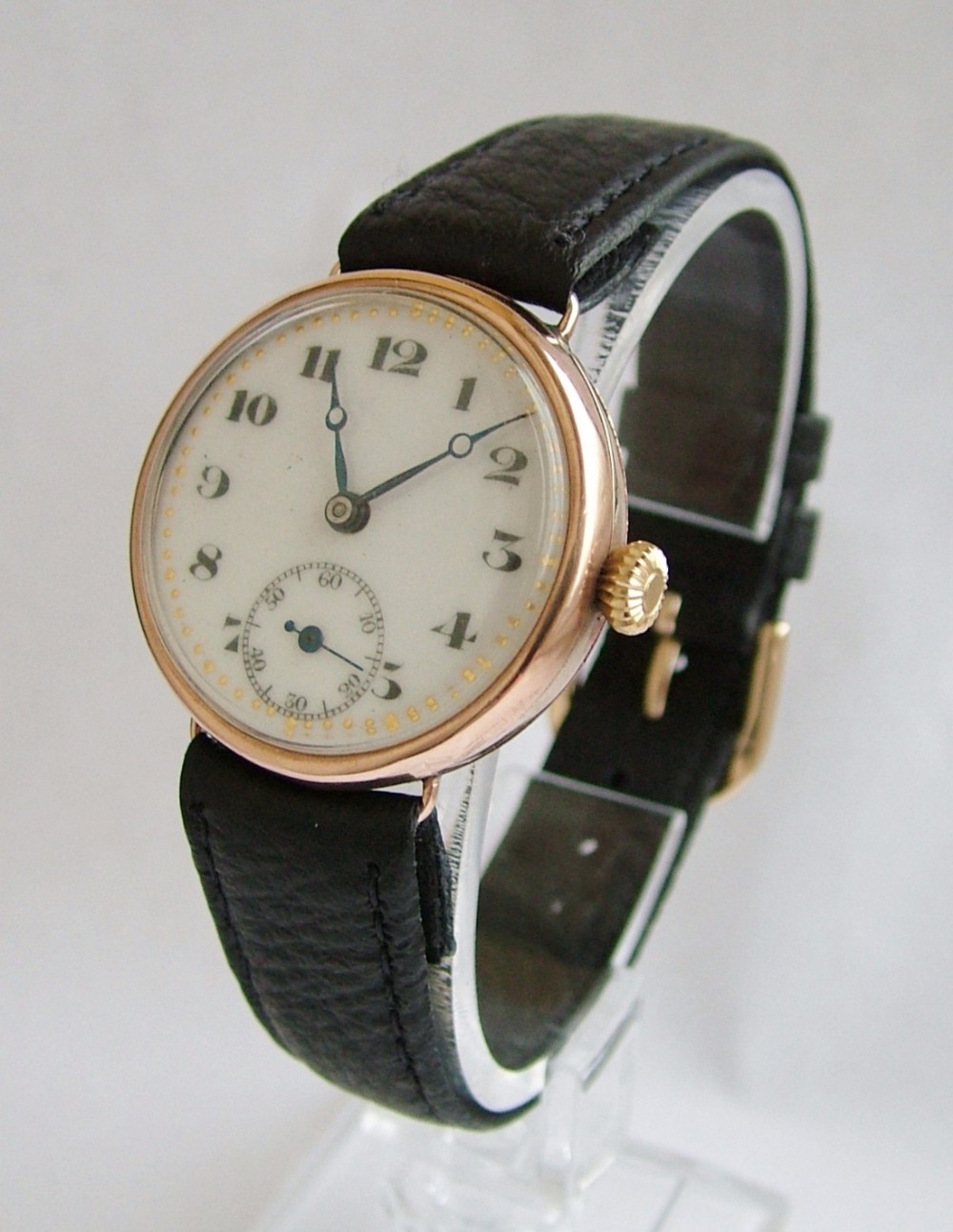 A 1920s 9 carat rose gold mid-size wrist watch