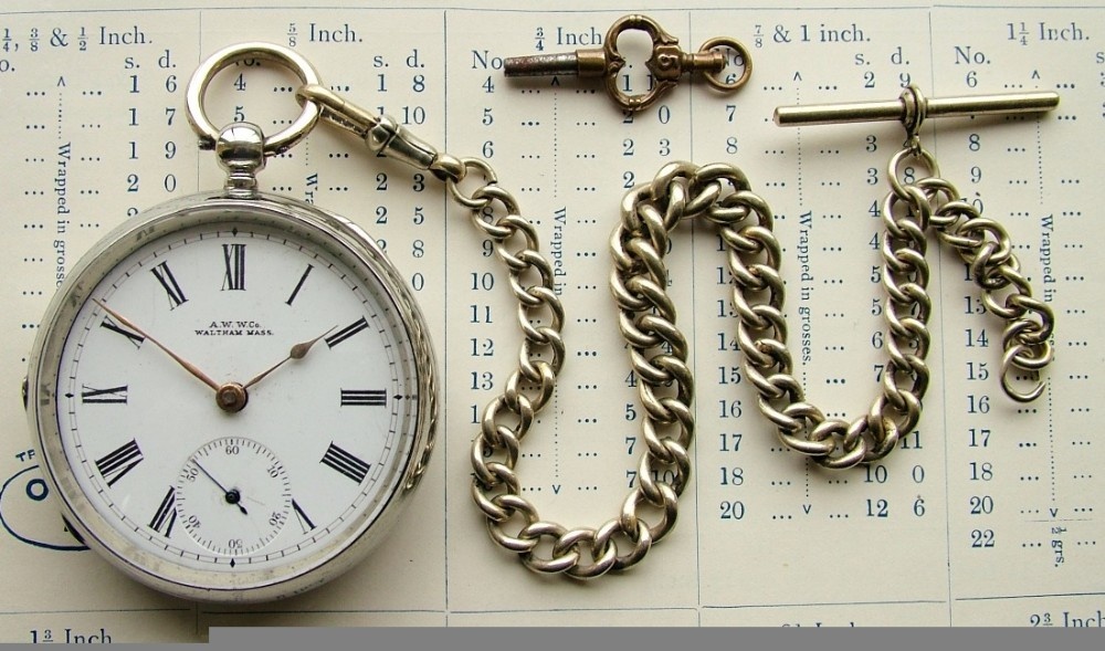 An antique Waltham pocket watch with albert.