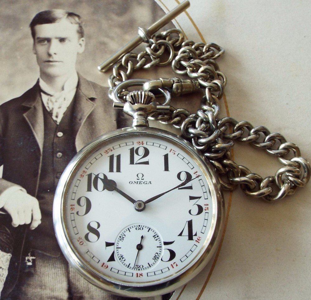 A 1920s Omega pocket watch with chain