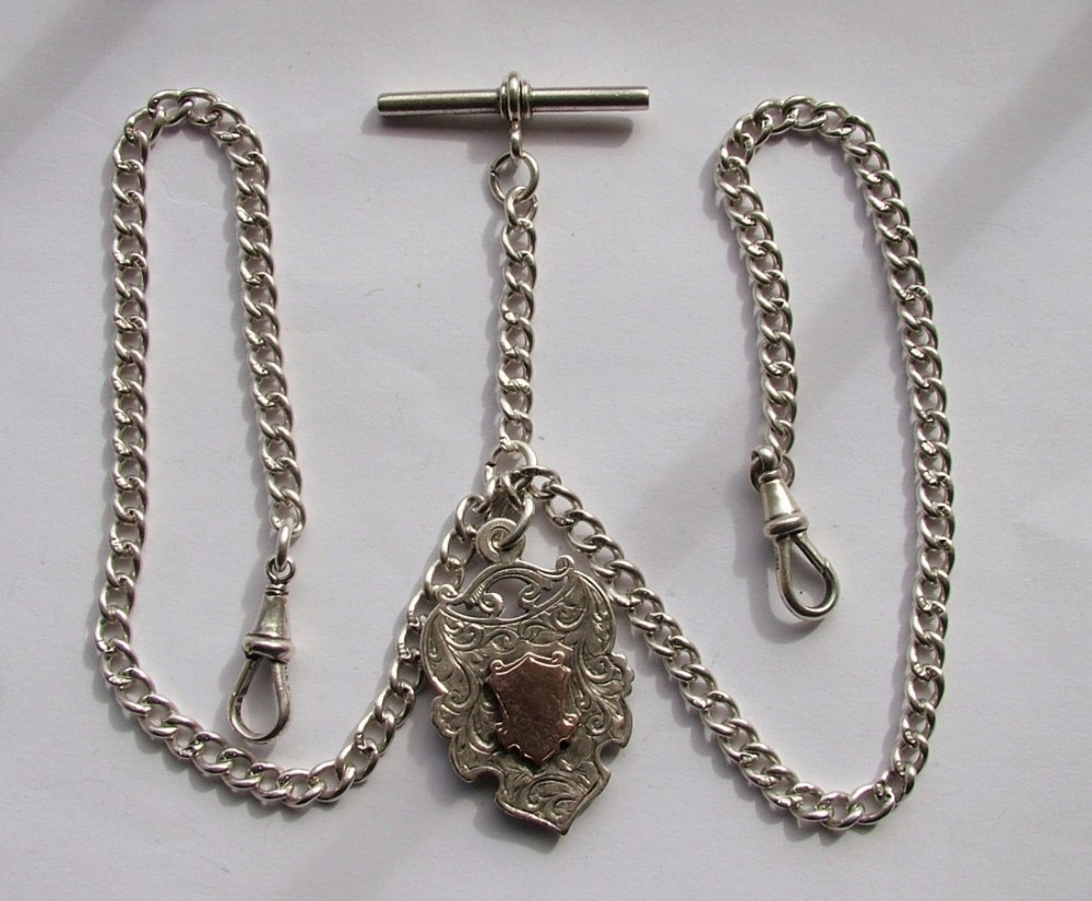 Antique silver double watch chain and fob.