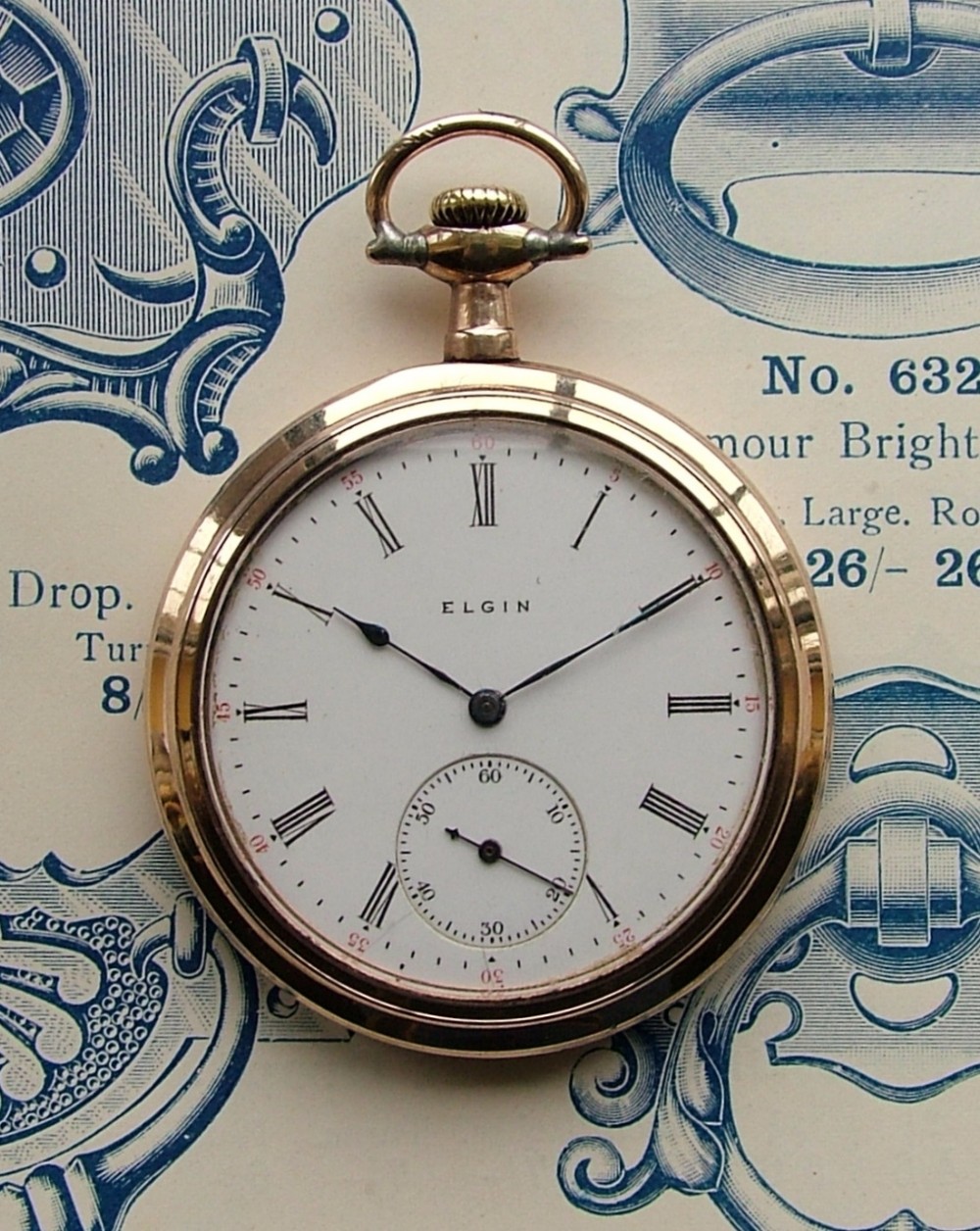 Antique 1917 gold plated Elgin stem winding pocket watch.