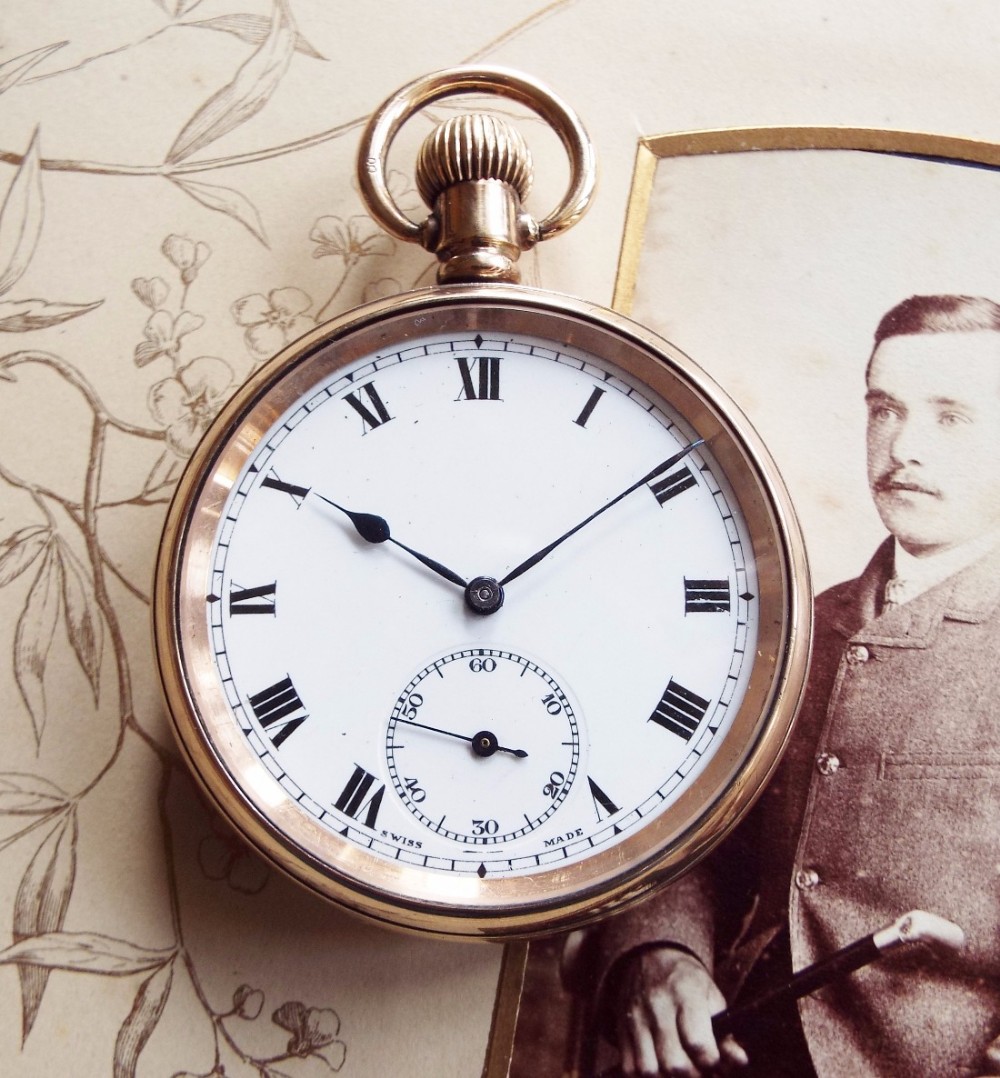 A 1920s Tacy open faced pocket watch