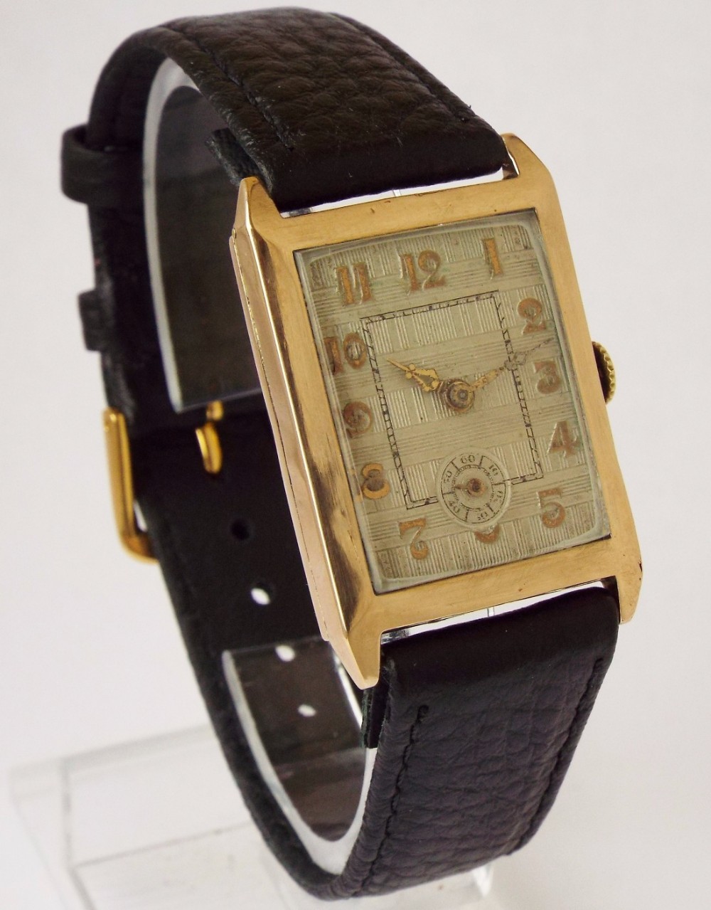A gents charming 1929 gold Art Deco wrist watch