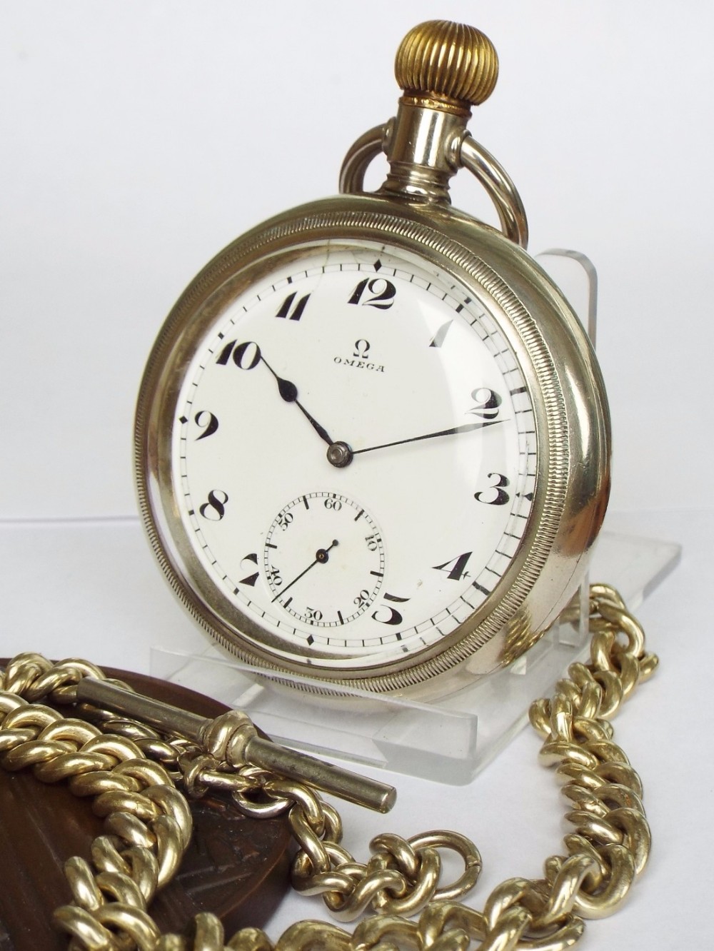 Large antique Omega pocket watch with albert