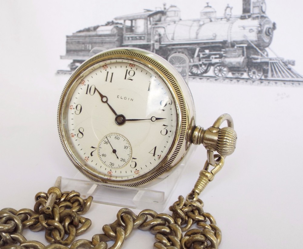 An antique 1908 Elgin pocket watch and chain