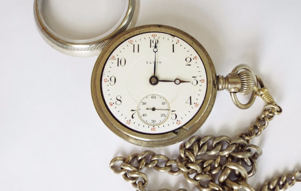 An antique 1908 Elgin pocket watch and chain View III
