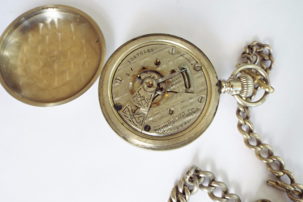 An antique 1908 Elgin pocket watch and chain View IV