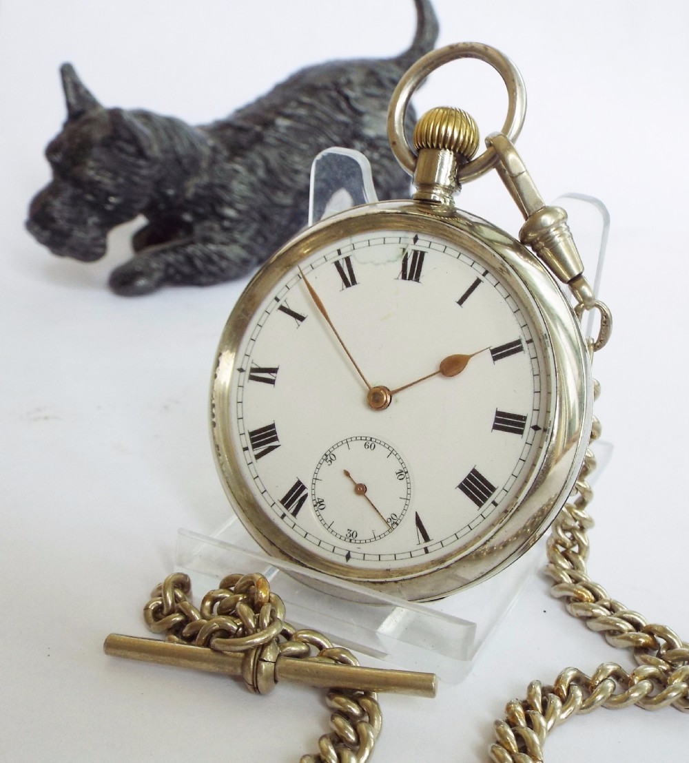 An antique Omega pocket watch with chain