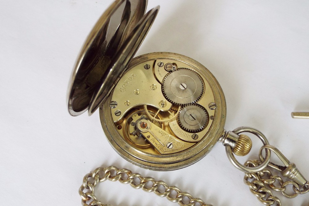 An antique Omega pocket watch with chain View II