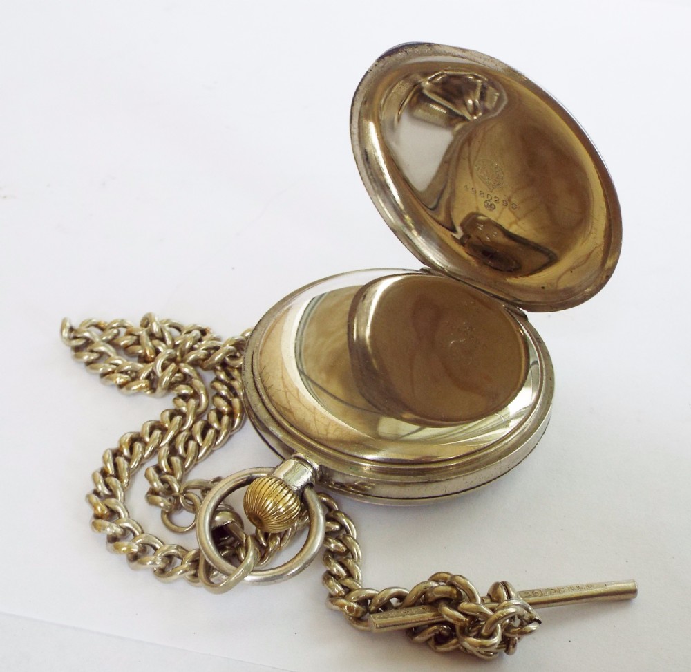 An antique Omega pocket watch with chain View III