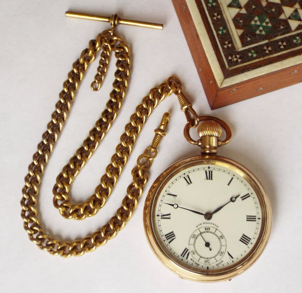 A 1930s gold plated pocket watch and chain View II